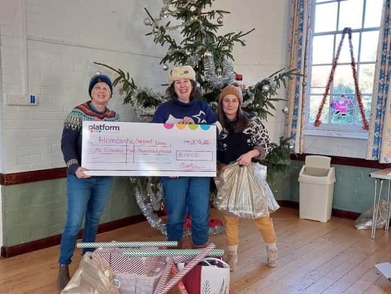 Platform’s Community Engagement Officer, Deborah Green (left) is pictured presenting the £1,500 cheque to Isabel Forrester (centre) and Nancy Sorenti (right) from Horncastle Support Team.
