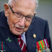 Captain Sir Tom Moore, seen visiting the Army Foundation College, Harrogate, has tested positive for Covid, his family say.