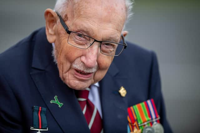 Captain Sir Tom Moore, seen visiting the Army Foundation College, Harrogate, has tested positive for Covid, his family say.