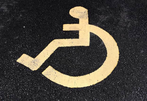 A sign for a disabled parking space