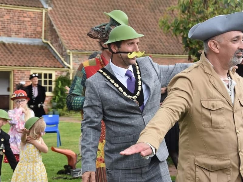 Mayor of Skegness Coun Adrian Findley (second right) gets a flying lesson.
