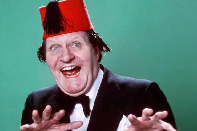 Late comedian and magician Tommy Cooper (1921-1984), who was renowned for wearing red fez hats and for his catchphrase, 'just like that!'. (PHOTO BY: Getty Images)