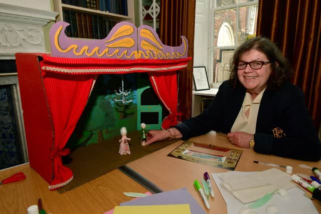 Penny Briggs with a Georgian paper theatre.