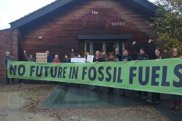 Campaigners make their feelings known against the use of fossil fuels.
