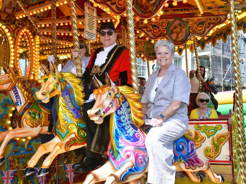 The Mayor of Boston Coun Barrie Pierpoint and Mayoress Pamela Love on the gallopers.