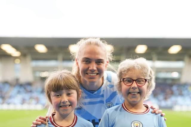 Mia (left) with Esme Morgan (centre) and sister Ruby.