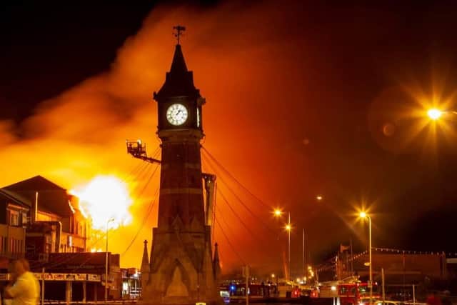 The fire quickly spread across the seafront, turning the sky behind the Clock Tower red.