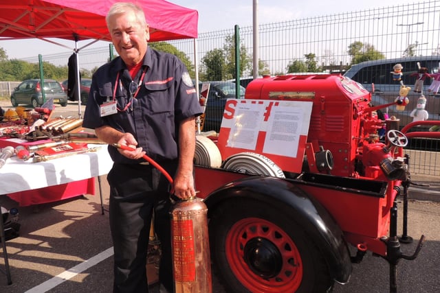Dave Gledhill from the Lincolnshire Fire and Rescue Volunteer Support Service with a display of old extinguishers, hoses and pumps from his personal museum.