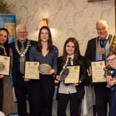 The winners with family, Rotary district governor David Kendrick, left, and Boston Mayor, Coun David Brown, right.