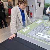 MP Victoria Atkins studying a model of the possible nuclear waste dump on agricultural land between the villages of Gayton le Marsh and Great Carlton.