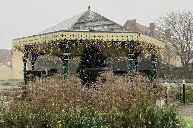 Snow adding to the festive look of the bandstand in Tower Gardens, Skegness, which has been trimmed with lights for the switch-on.