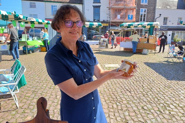 Sue Heron on her honey stall. Image: Dianne Tuckett