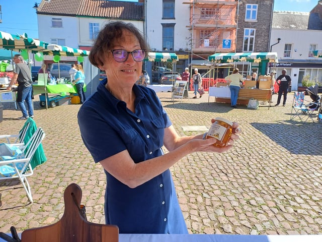 Sue Heron on her honey stall. Image: Dianne Tuckett