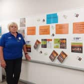 Market Rasen Tesco's Community Champion Amanda Gwyther with some of the information that can be found outside the toilet area of the Linwood Road store. Image: Dianne Tuckett