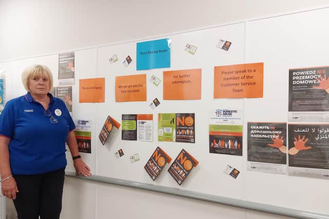 Market Rasen Tesco's Community Champion Amanda Gwyther with some of the information that can be found outside the toilet area of the Linwood Road store. Image: Dianne Tuckett
