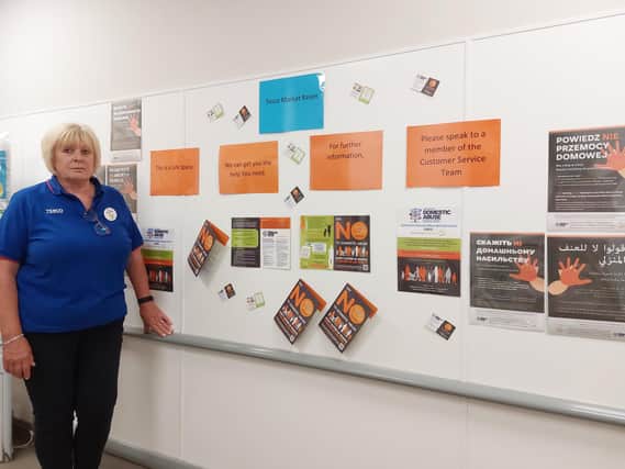 Market Rasen Tesco's Community Champion Amanda Gwyther with some of the information that can be found outside the toilet area of the Linwood Road store. Image: Dianne Tuckett
