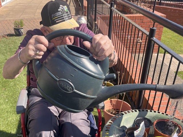 Resident George at HC-One’s Elmwood House Care Home gardening