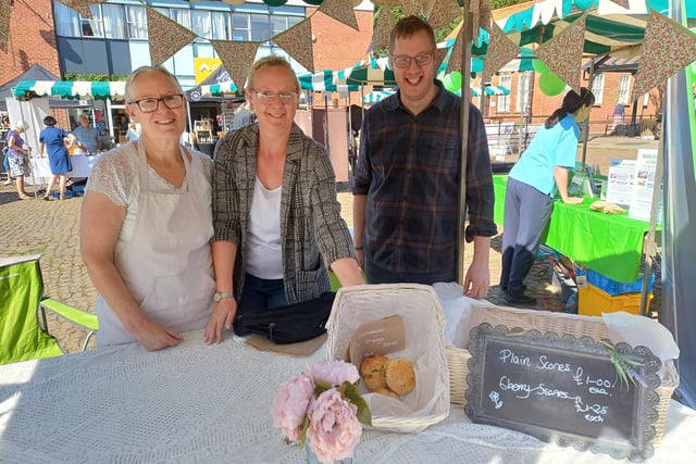 Sharon Morrison, left, sold out of her scones by midday. She is pictured with daughter Emma Cox, who helped on the stall, and event co-organiser Matt Horsefield. Image: Dianne Tuckett
