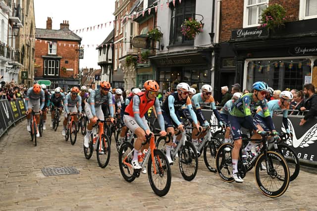 Riders take part at the start of the first stage of the Tour of Britain cycle race in Lincoln, eastern England on September 2, 2026. (Photo by Oli SCARFF / AFP via Getty Images)