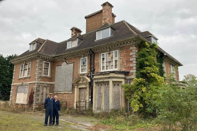 Charles and Sally Pinchbeck in front of Heckington Manor on the day they bought it in 2020. Photo: Charles Pinchbeck