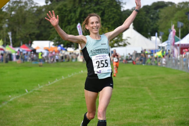 First woman to cross the line in the 10 mile road race, Emma Hodson of Cambridge (formerly of Ewerby).