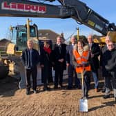Louth & Horncastle MP Victoria Atkins (centre) cuts the first piece of turf on the new Campus for Future Living.