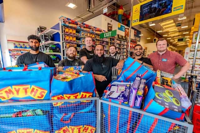 Atiq Rehman, founder of Unspoken – A New Voice for Kindness and the toy-drop team.