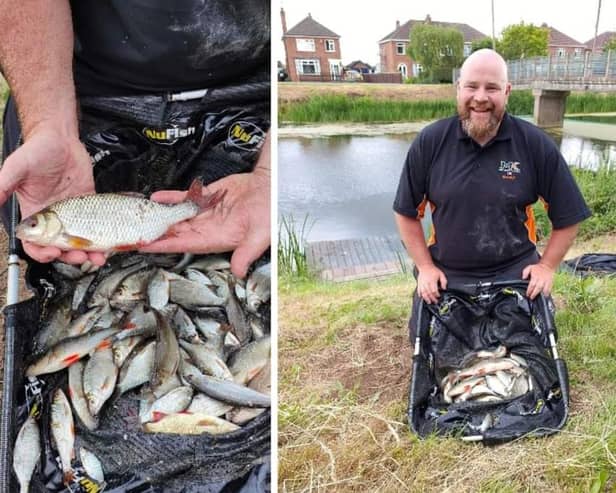 Winner Danny West shows off his catch.