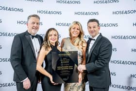 David Honman, Business Manager at Coastfields Leisure – the parent company of Addlethorpe Golf and Country Club (L), Victoria Spence, Bookings Manager at Coastfields Leisure (centre left) and Lloyd Silvester, Managing Director of Coastfields Leisure (R) receive the park’s award from Gemma Brown, General Manager of Hoseasons (centre right).