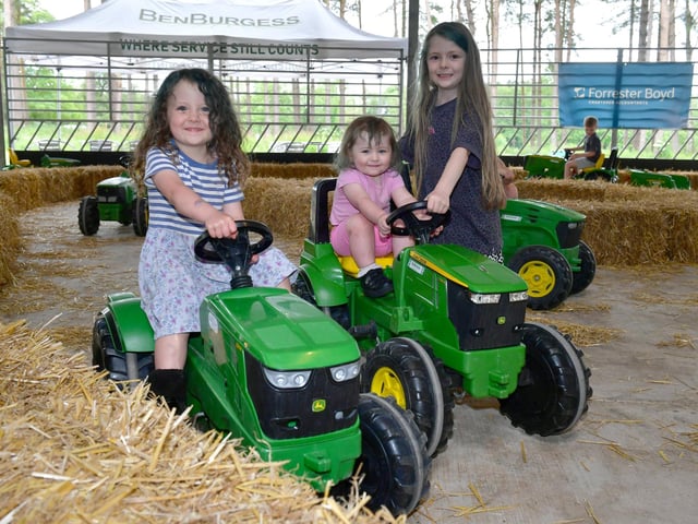 L-R Bonnie Caush 4, Cassidy Caush 2 and Amelia Caush 7 of Tumby Woodside take a ride at the Open Farm Sunday event at Stourton Estate. Photo: David Dawson