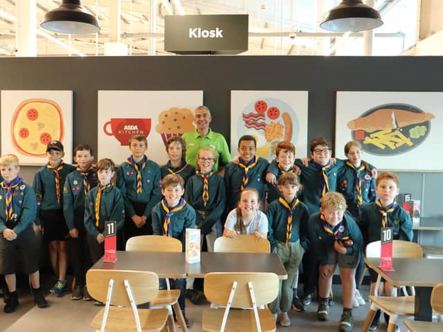 Stephen Bromby, community champion at Asda, with Scouts during one of the 'green' tours.