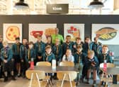 Stephen Bromby, community champion at Asda, with Scouts during one of the 'green' tours.