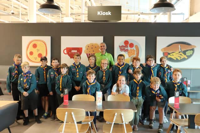 Stephen Bromby, community champion at Asda, with Scouts during one of the 'green' tours.