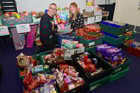 Lincolnshire Community Foundation donate £2,000 to the New Life Community Food Larder to replenish the stocks. Claire Edwards - Lincolnshire Community Foundation, with Rod Munro - project team leader