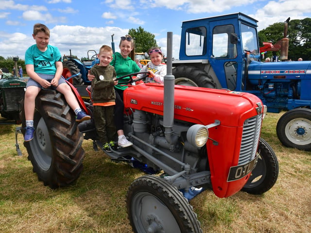 L-R Riley Brickwell 10, Harvey Brickwell 6, Lexi Sandall 14 Harper Sandall sitting on a 1965 Masy-Ferguson 35