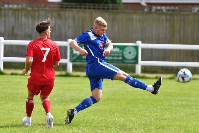 Alex Carter stretches for the ball in Louth's 3-0 defeat by Thorne on Saturday.