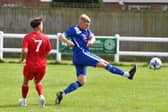 Alex Carter stretches for the ball in Louth's 3-0 defeat by Thorne on Saturday.