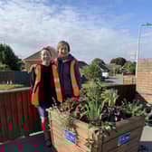 Glen and Billie with their planters.