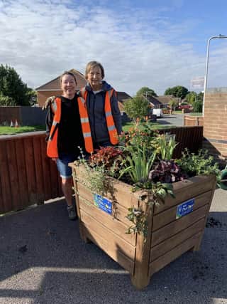 Glen and Billie with their planters.