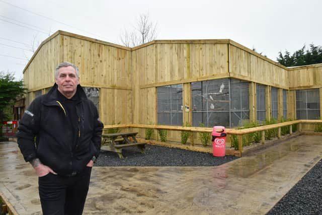 Lincolnshire Wildlife Park CEO Steve Nicholls outside the new aviary where the swearing parrots now live.