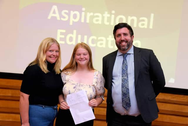 Louth Academy's highest-scoring student Jasmin Dodds celebrates her GCSE results with mum Sarah Parkin (left), and Philip Dickinson, Principal of Louth Academy.