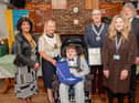 Kayden Haw with his Children of Courage Award, pictured alongside Boston Mayor, Coun Anne Dorrian. Rotary Club members and Kayden's teacher.