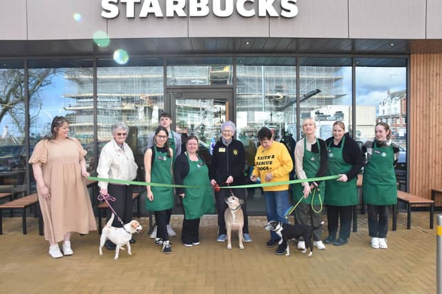 Staff and volunteers from Keith's Rescue Dogs at the official opening of Starbucks in Skegness.