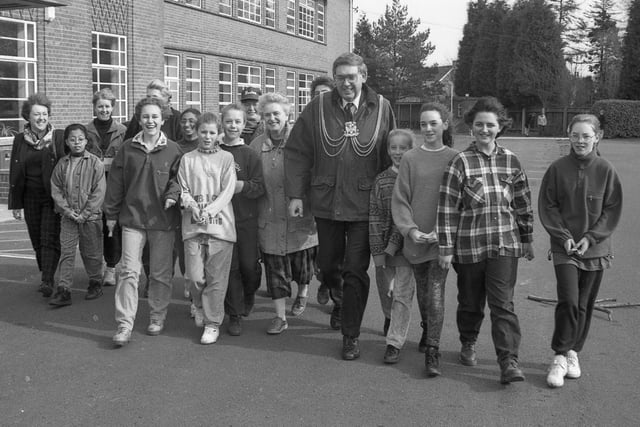 Boston High School was expecting to have raised £2,300 in sponsorship through its annual walk of 1994. Among those taking part in the fundraiser were the Mayor and Mayoress of Boston Couns Keith and Joyce Dobson. The funds would be used to enable the school to heat and maintain its swimming pool that summer. Couns Dobson are pictured with some of the pupils who took part.