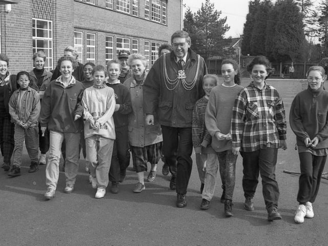 Boston High School was expecting to have raised £2,300 in sponsorship through its annual walk of 1994. Among those taking part in the fundraiser were the Mayor and Mayoress of Boston Couns Keith and Joyce Dobson. The funds would be used to enable the school to heat and maintain its swimming pool that summer. Couns Dobson are pictured with some of the pupils who took part.