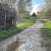 The muddy path through Lollycocks Field due to be upgraded.