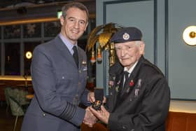 Station Commander RAF Coningsby, Group Captain Billy Cooper presented the Nuclear Test Medal to retired RAF Firefighter, John, ‘Dusty’ Millar. Photo: UK MOD Crown Copyright 2023