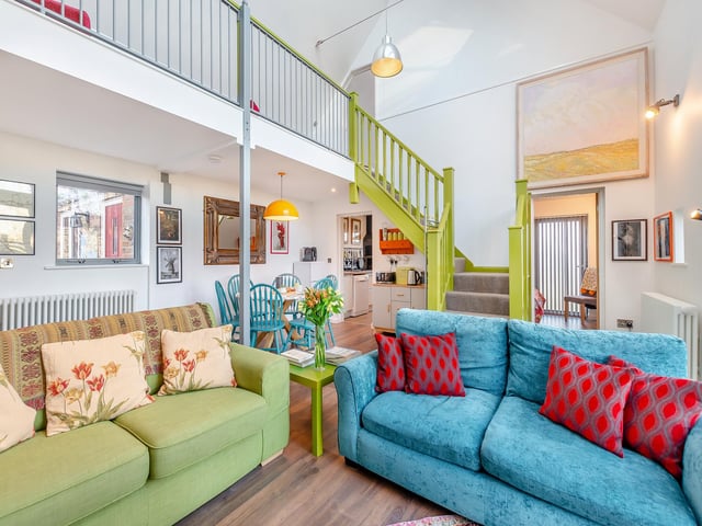 The artistic owners created a two-storey living space. Photo: Hope & Glory