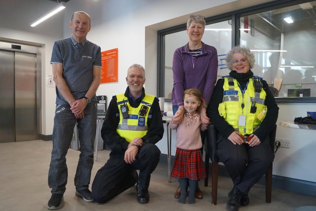 PCSOs Neal Evans and Jackie Parker with John, Christine and Ava Whitwell