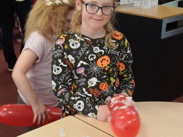 Adding static electricity from balloons to ghosts. Photo: Dianne Tuckett